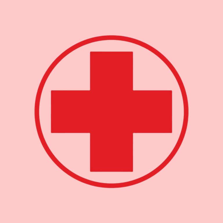 На рожевому фоні червоне коло з хрестом всередині